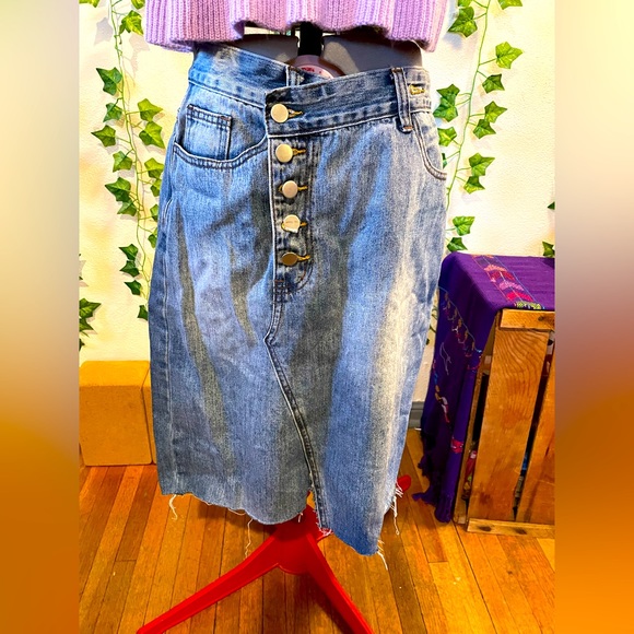 Jean skirt. High rise with asymmetrical button up detail - Picture 1 of 4
